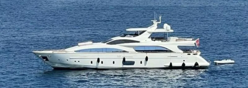 a white yacht in the water aboard VIVERE Yacht for Sale