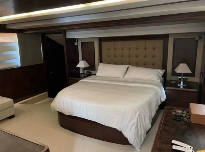 a bed in a room aboard VIVERE Yacht for Sale