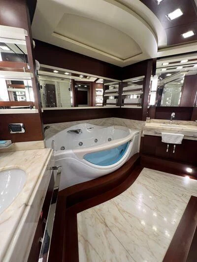 a bathroom with a large tub aboard VIVERE Yacht for Sale