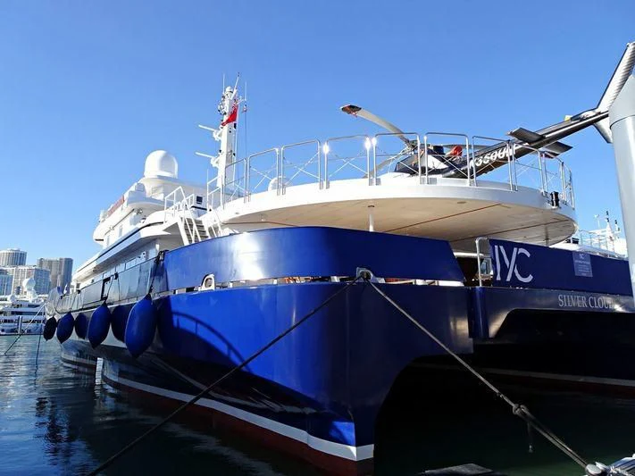a large blue and white boat aboard NURJA Yacht for Sale