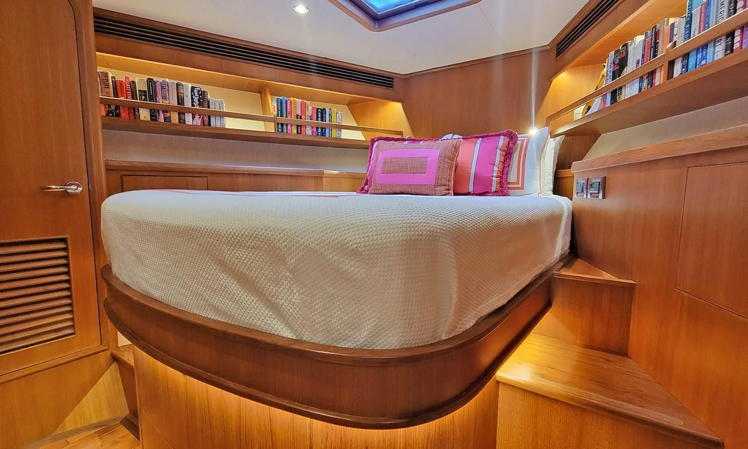 a bed in a room aboard SUERTUDO Yacht for Sale