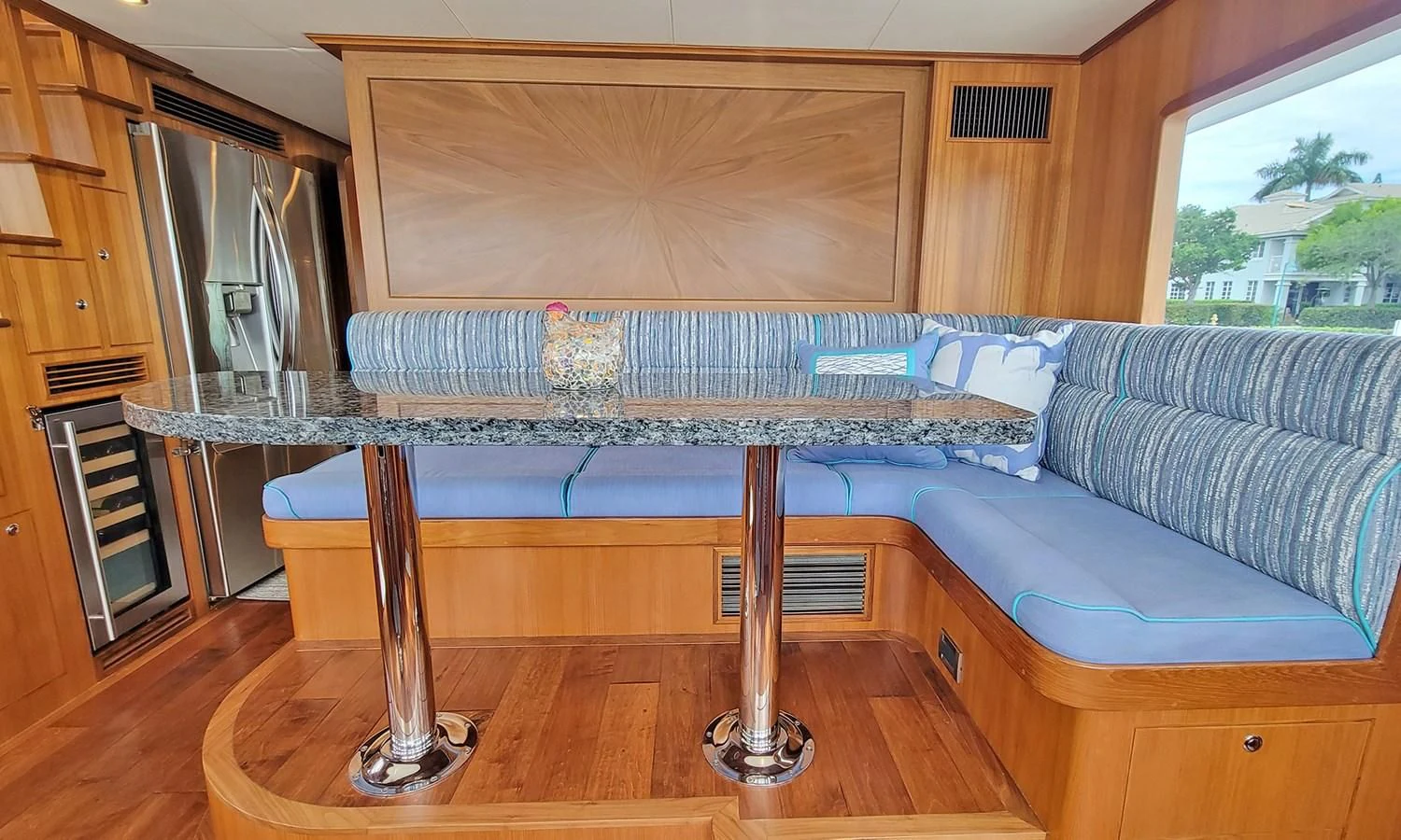 a living room with a couch and a table aboard SUERTUDO Yacht for Sale