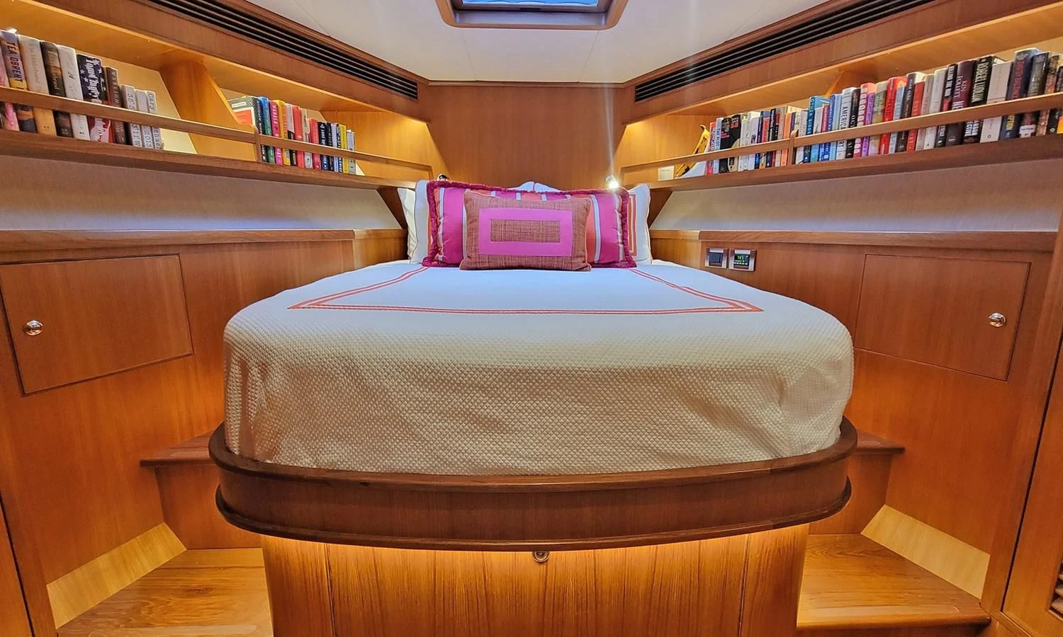 a bed in a room aboard SUERTUDO Yacht for Sale