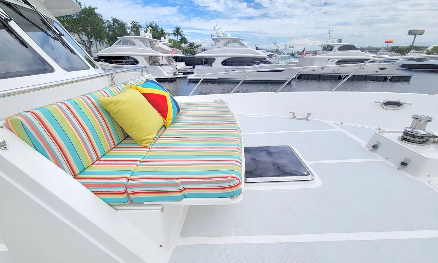 a group of boats parked in a harbor aboard SUERTUDO Yacht for Sale