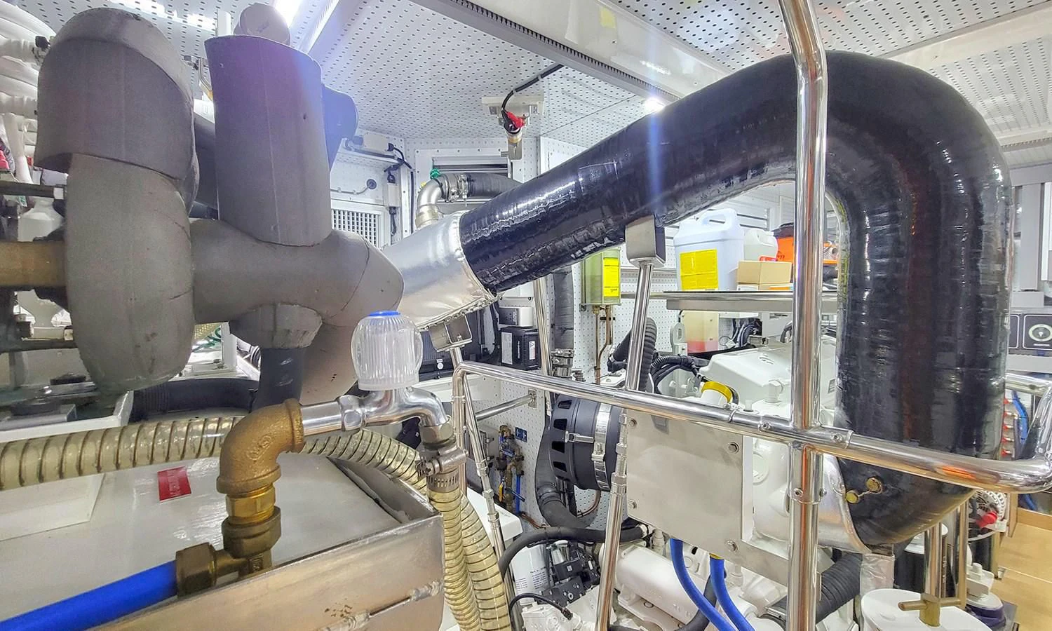 a factory with pipes and tubes aboard SUERTUDO Yacht for Sale
