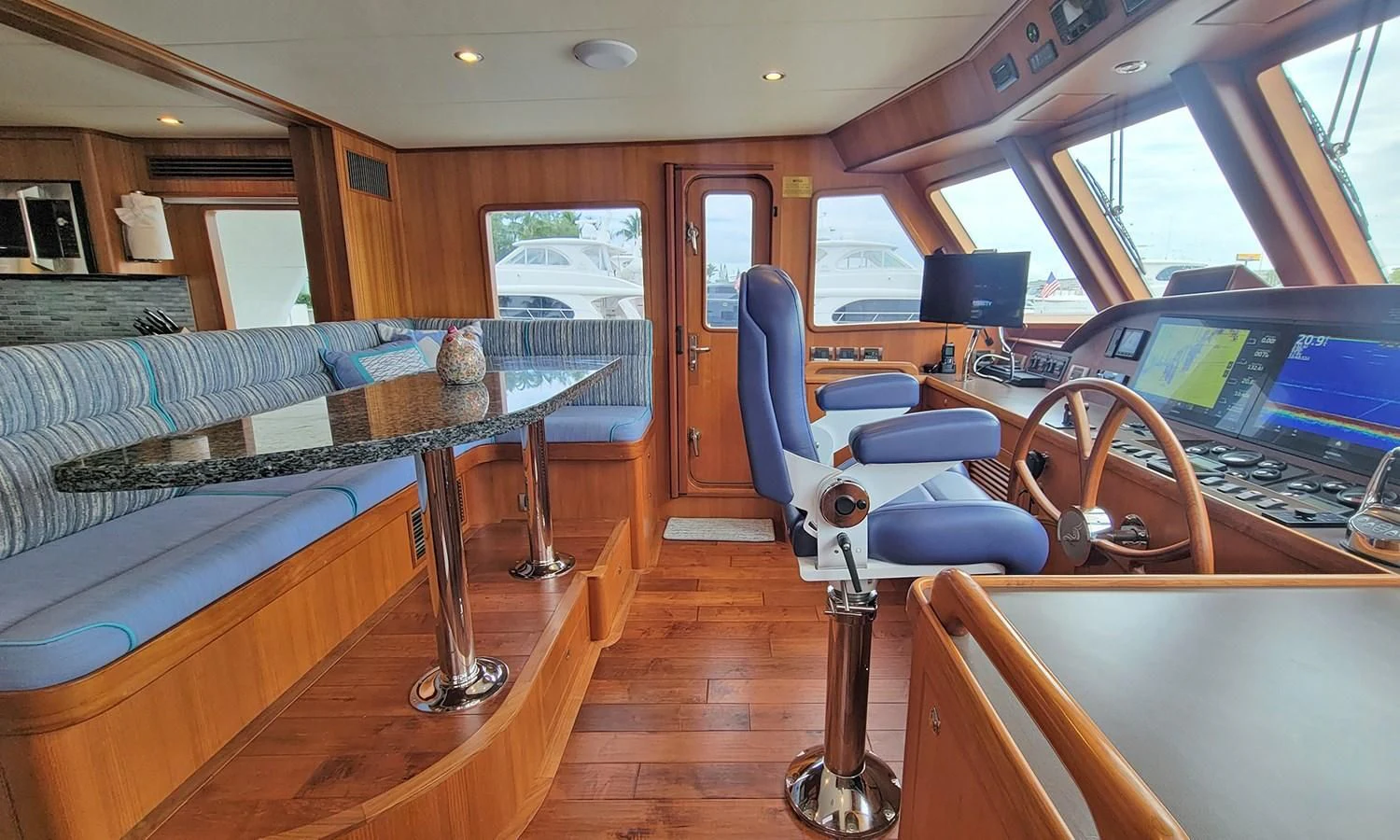 inside of a car aboard SUERTUDO Yacht for Sale