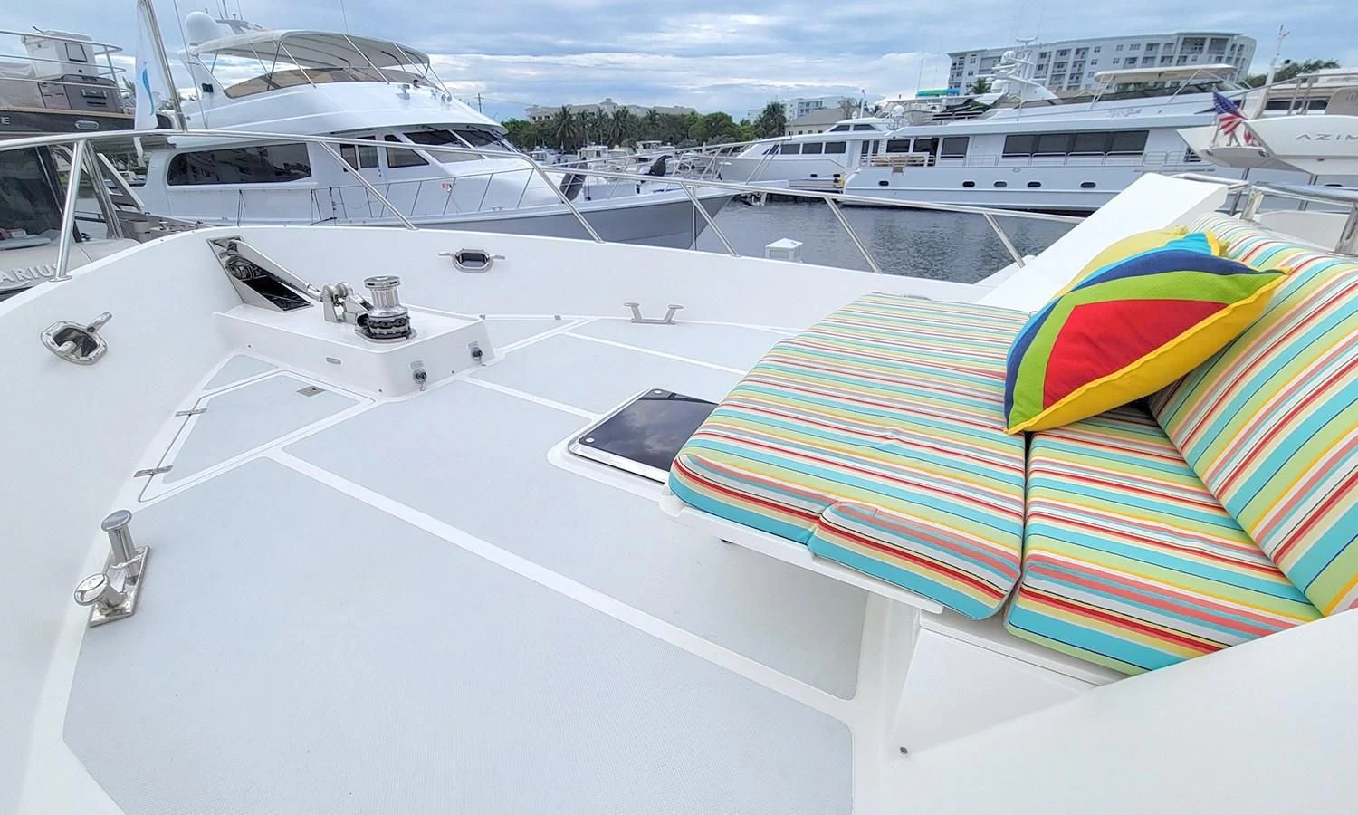 a group of boats in a harbor aboard SUERTUDO Yacht for Sale