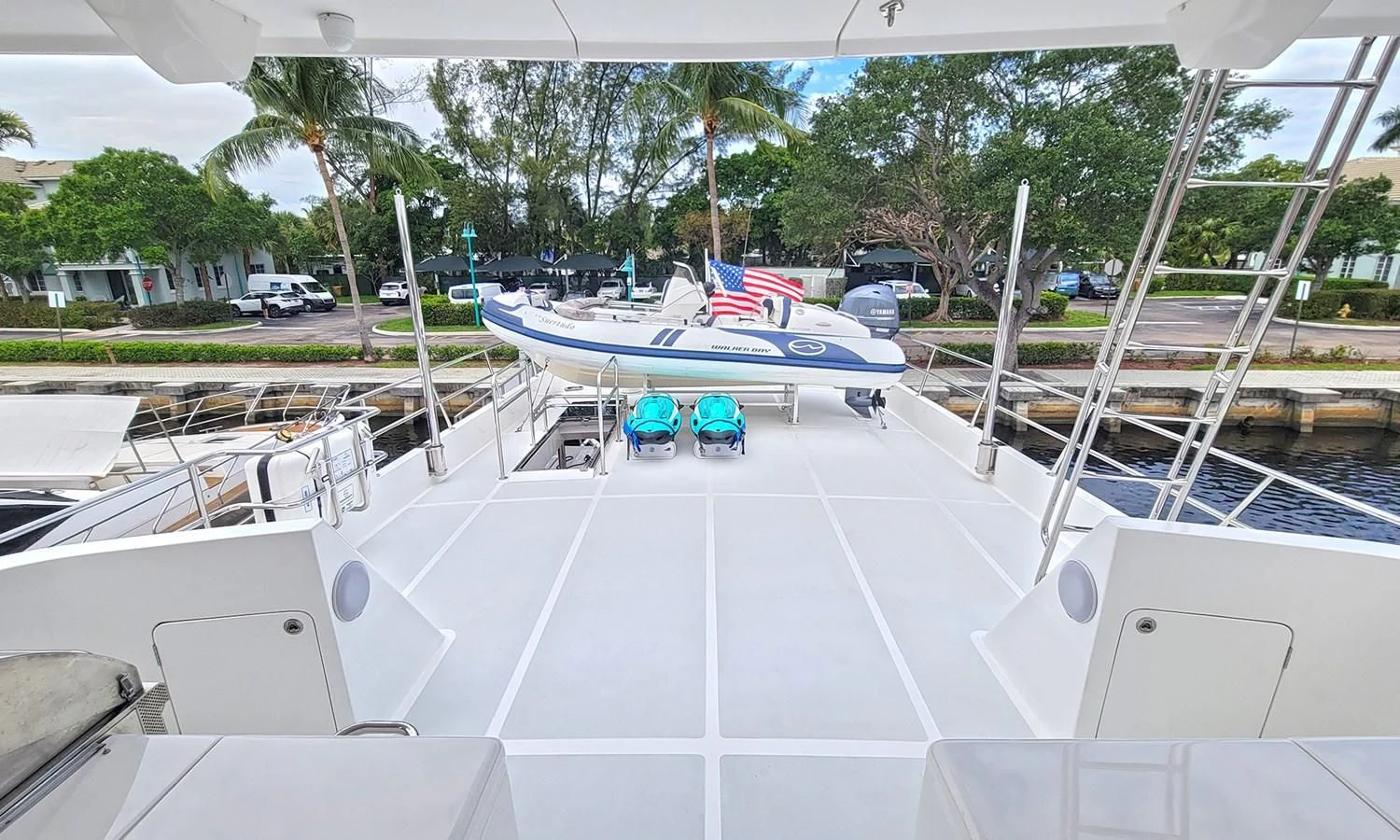 a boat docked at a pier aboard SUERTUDO Yacht for Sale