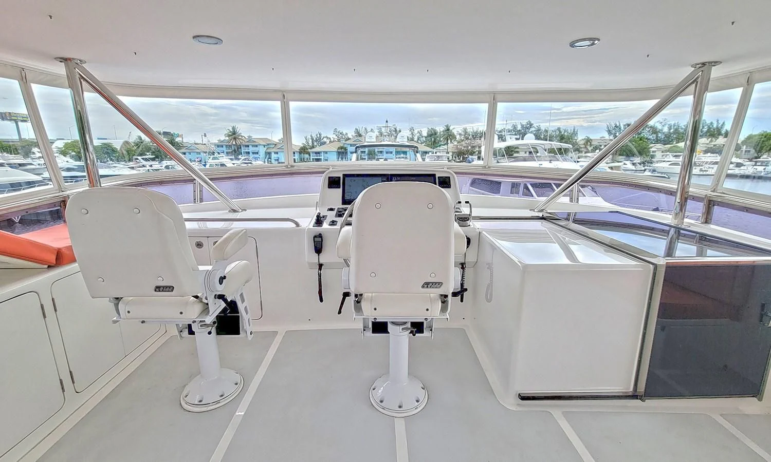 a white machine on a white surface aboard SUERTUDO Yacht for Sale