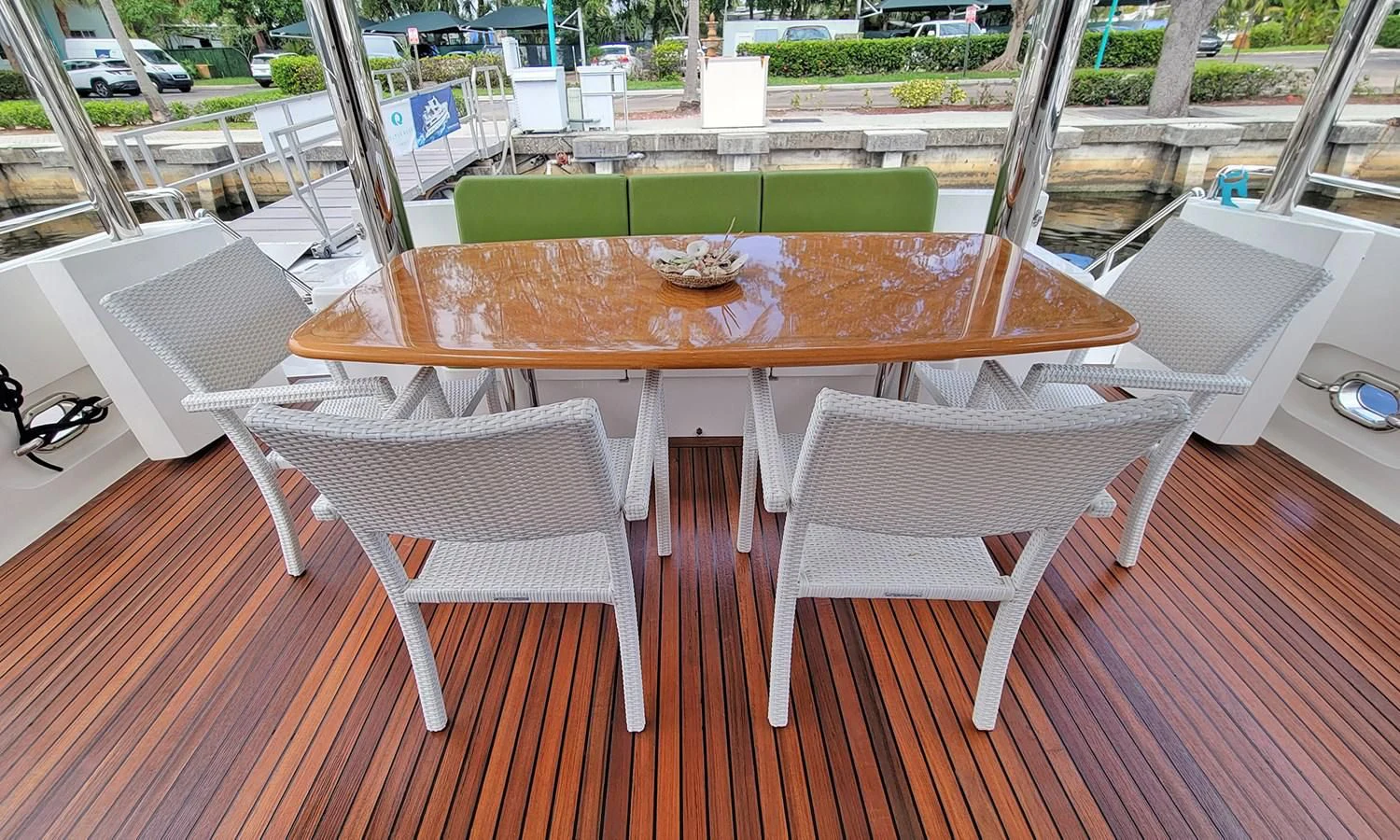a table with chairs around it aboard SUERTUDO Yacht for Sale