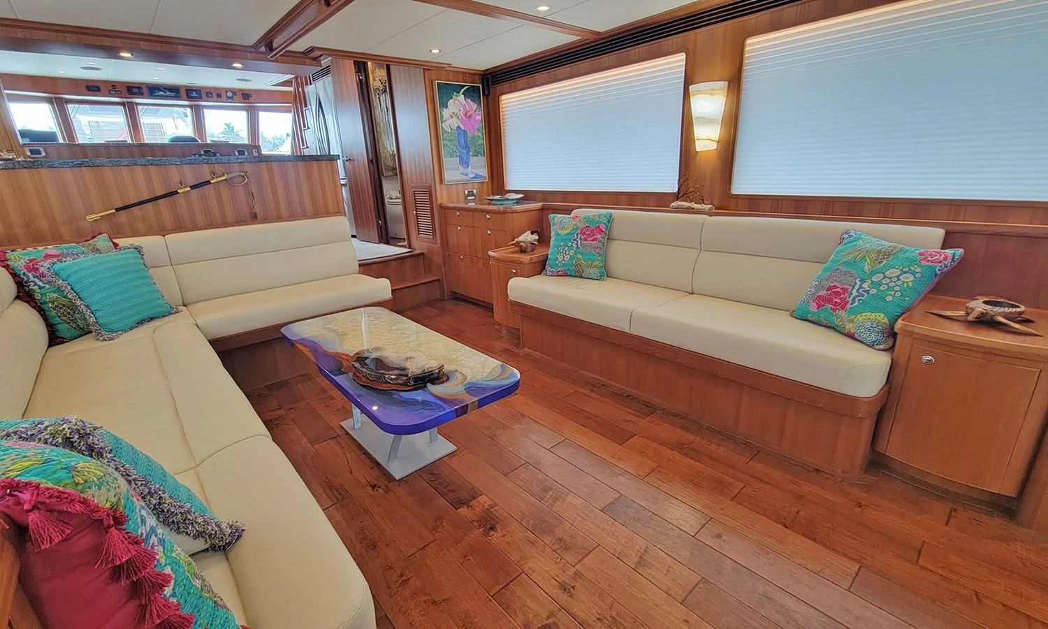 a room with a bed and a couch aboard SUERTUDO Yacht for Sale