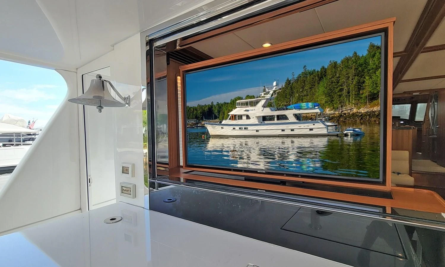 a view of a boat on the water from inside a vehicle aboard SUERTUDO Yacht for Sale
