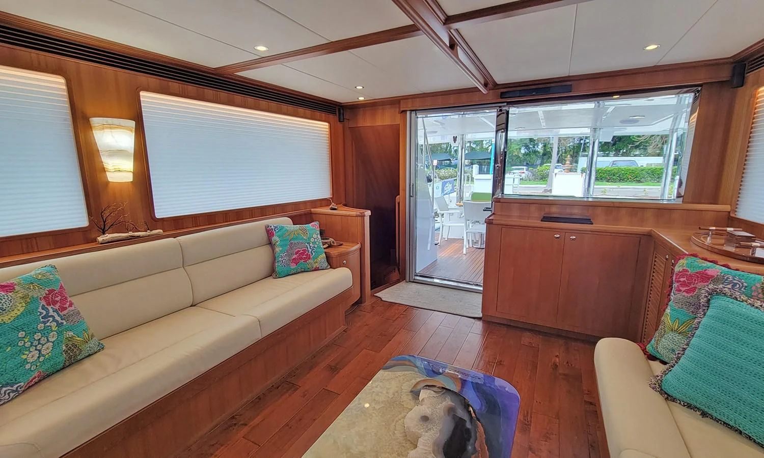 a dog on a couch in a living room aboard SUERTUDO Yacht for Sale