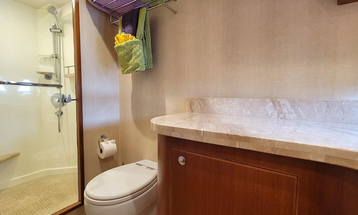 a bathroom with a sink and toilet aboard SUERTUDO Yacht for Sale