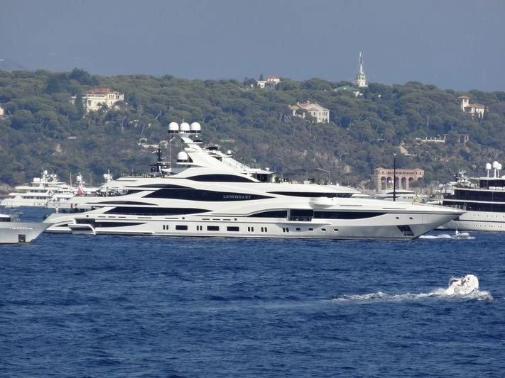 a large white boat in the water aboard LIONHEART Yacht for Sale