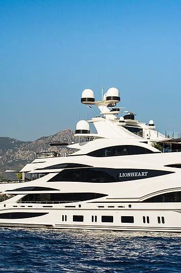 a large white yacht aboard LIONHEART Yacht for Sale