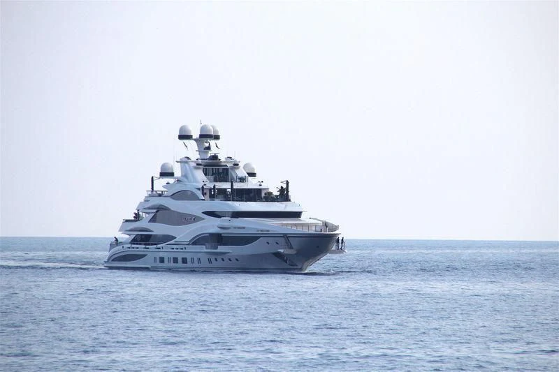 a large white boat in the water aboard LIONHEART Yacht for Sale