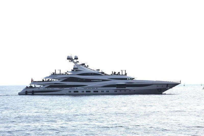 a large ship in the water aboard LIONHEART Yacht for Sale