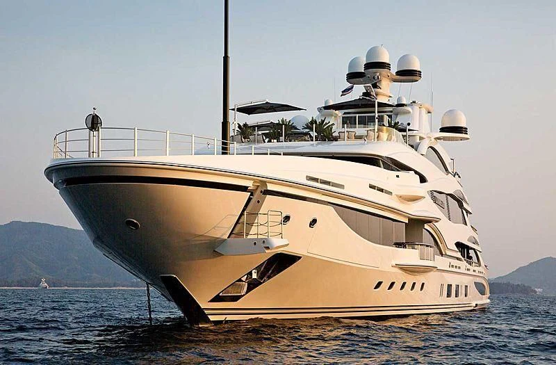 a large white boat in the water aboard LIONHEART Yacht for Sale
