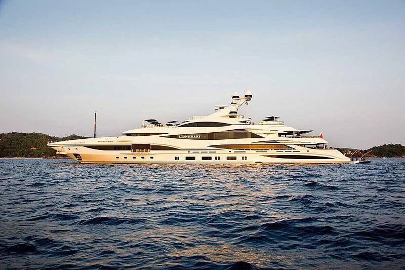 a large ship in the water aboard LIONHEART Yacht for Sale