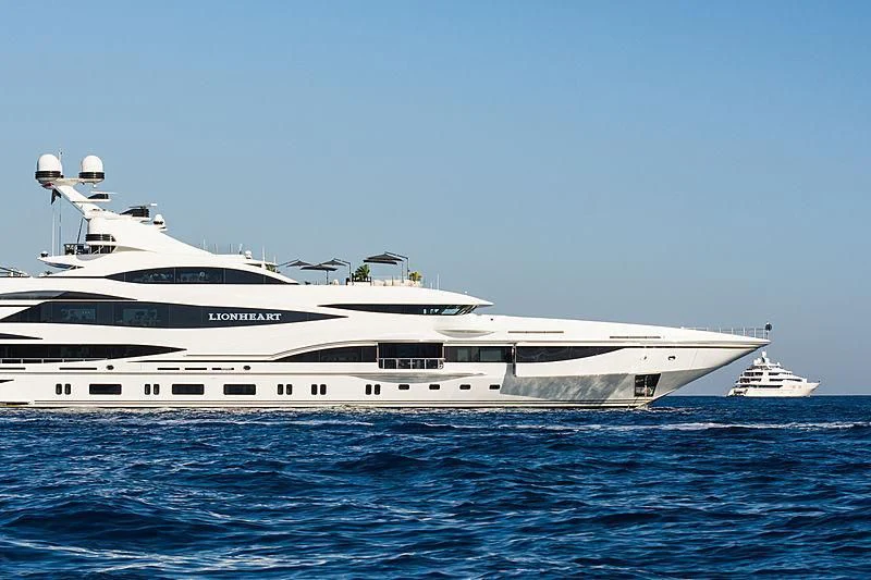 a large white yacht in the water aboard LIONHEART Yacht for Sale