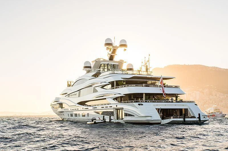 a large white ship in the water aboard LIONHEART Yacht for Sale