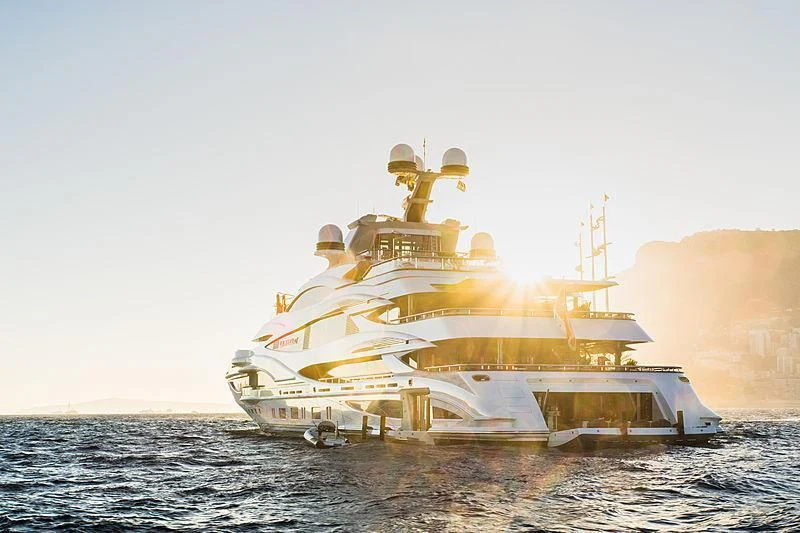 a large ship in the water aboard LIONHEART Yacht for Sale