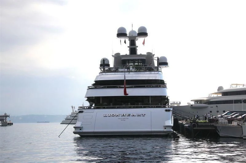 a large white boat in the water aboard LIONHEART Yacht for Sale
