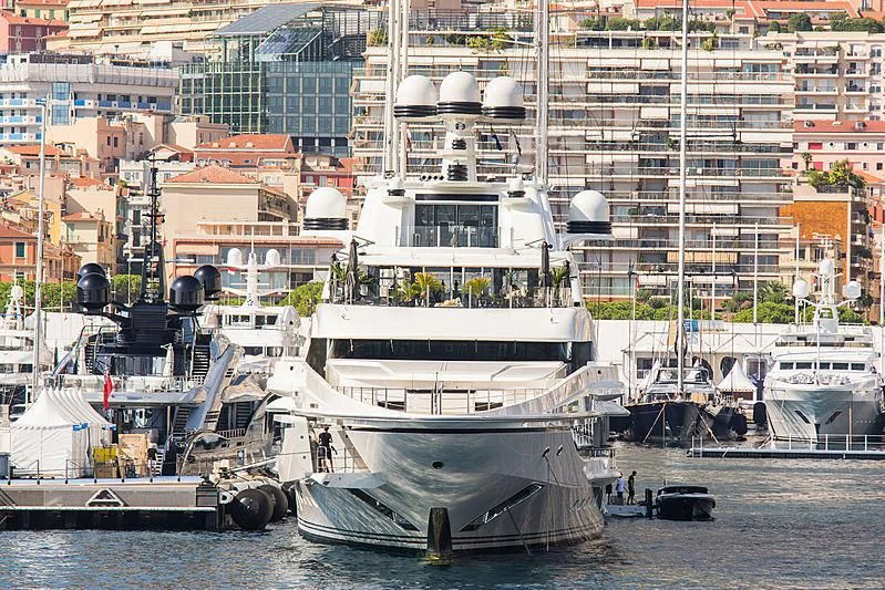 a large boat in a harbor aboard LIONHEART Yacht for Sale