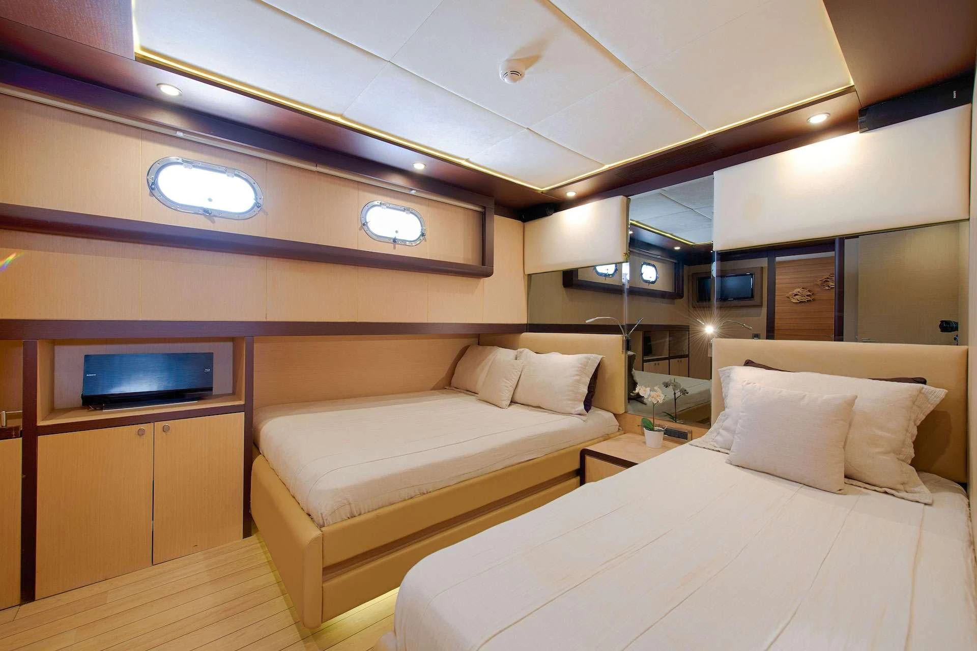 a room with two beds aboard THE WALL Yacht for Sale