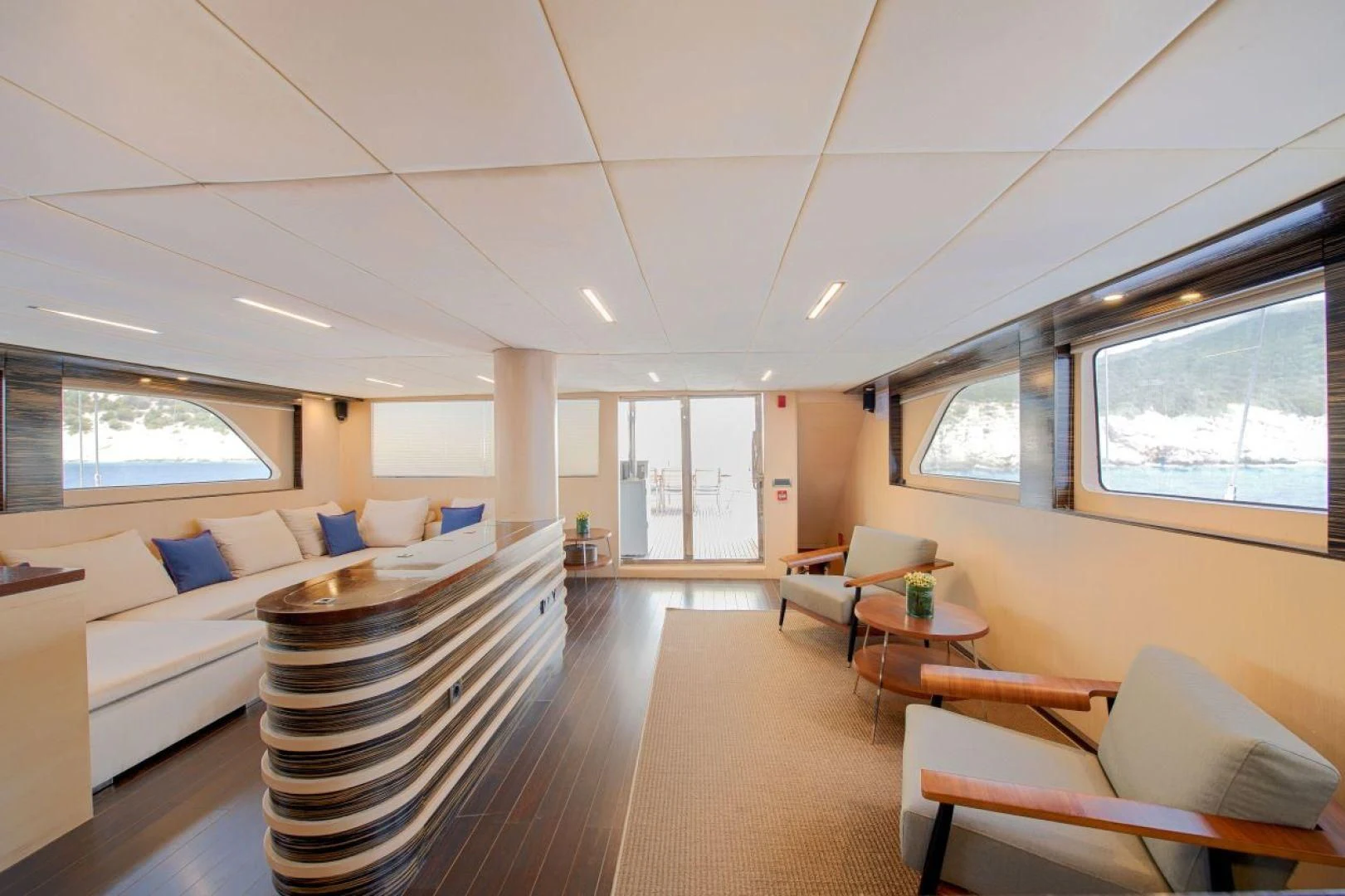 a living room with a couch and a table aboard THE WALL Yacht for Sale