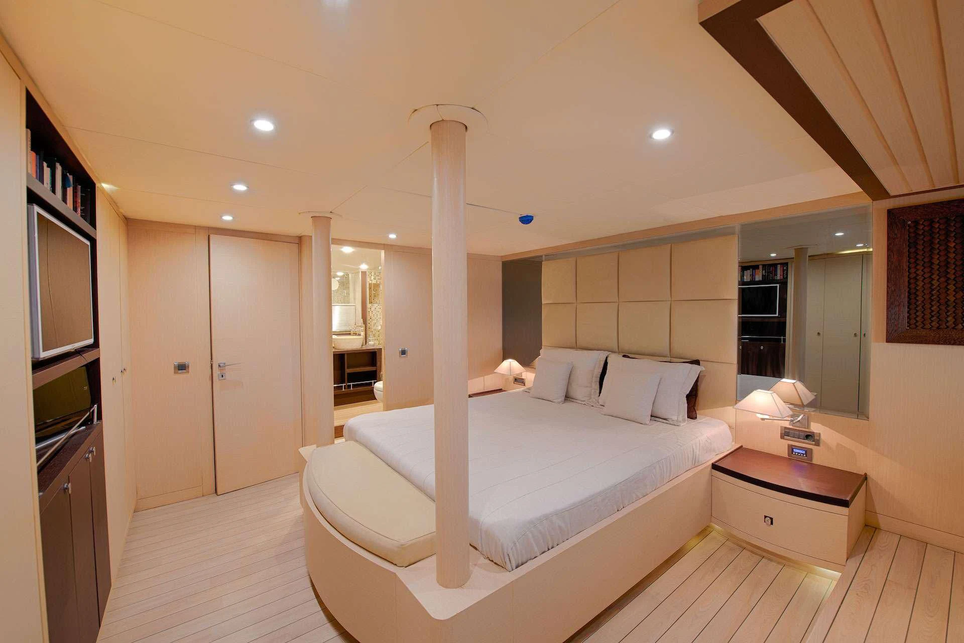 a large bedroom with a large bed aboard THE WALL Yacht for Sale