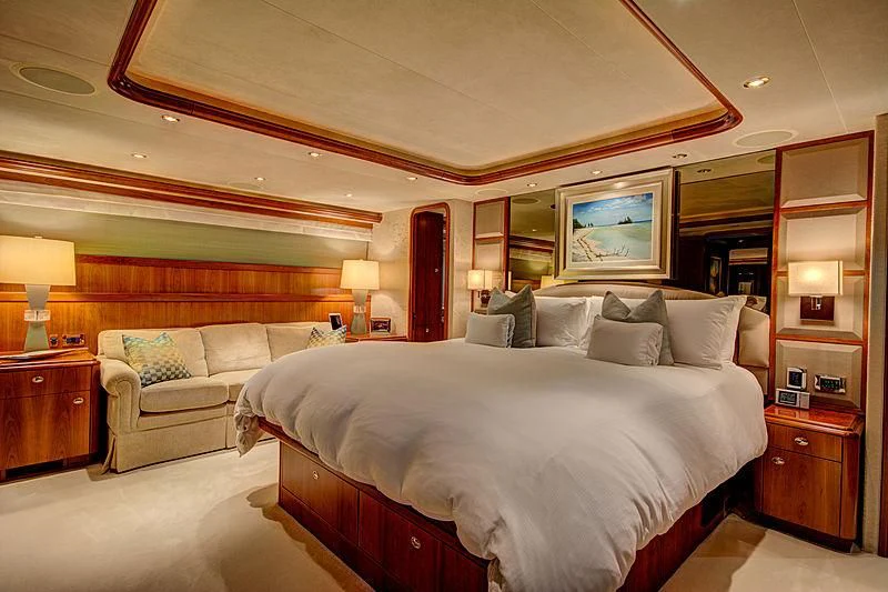 a large bed in a hotel room aboard LADY GRAY Yacht for Sale