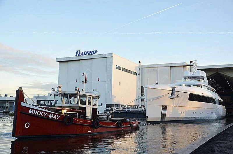 a boat docked at a pier aboard JC Yacht for Sale