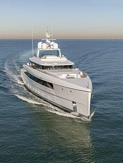 a large white boat in the water aboard JC Yacht for Sale