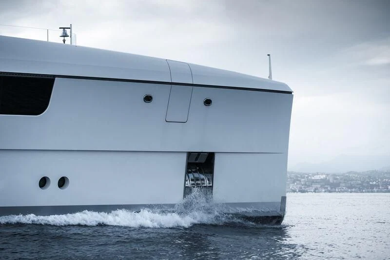 a white boat in the water aboard JC Yacht for Sale