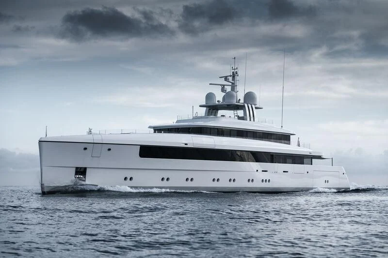 a white yacht in the water aboard JC Yacht for Sale