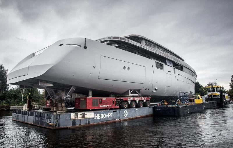 a large cruise ship docked aboard JC Yacht for Sale