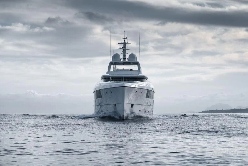 a white boat in the water aboard JC Yacht for Sale