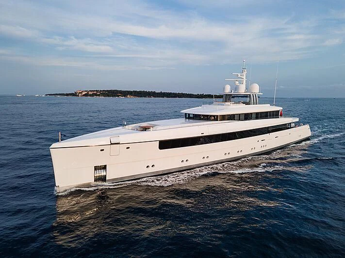 a white yacht on the water aboard JC Yacht for Sale