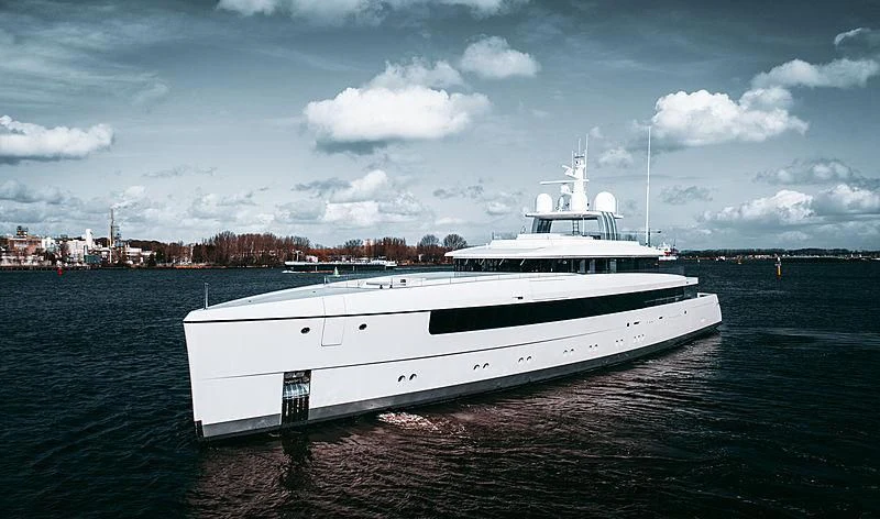 a large white boat in the water aboard JC Yacht for Sale