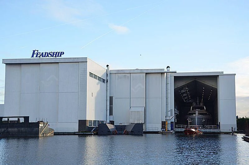 a building with a large garage aboard JC Yacht for Sale