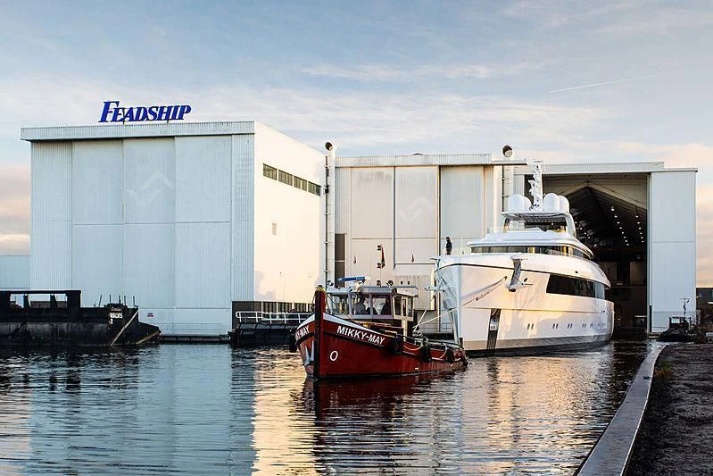 a boat docked at a port aboard JC Yacht for Sale