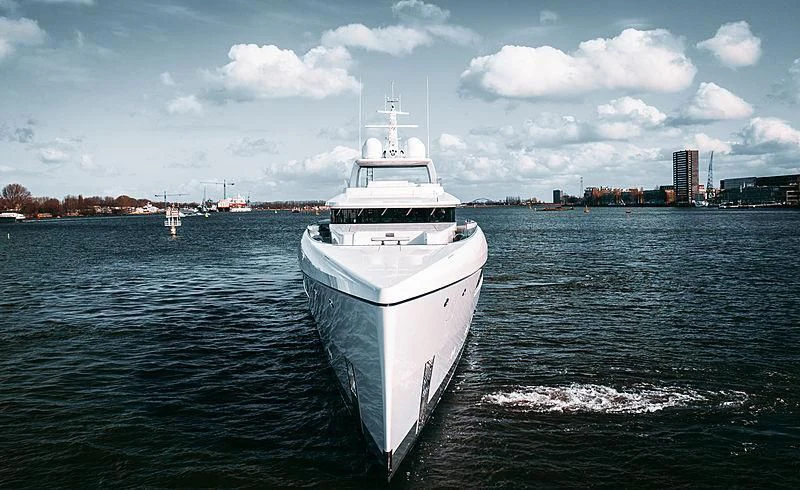 a large white boat in the water aboard JC Yacht for Sale