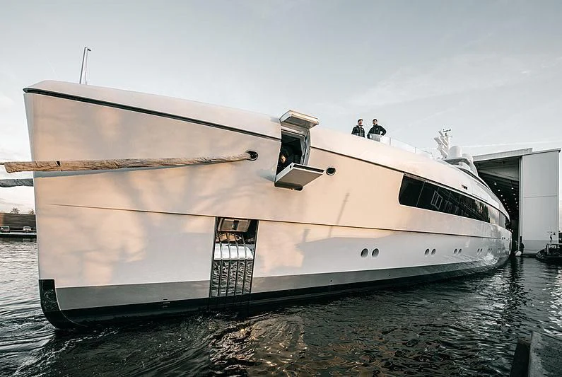 a large white boat on the water aboard JC Yacht for Sale