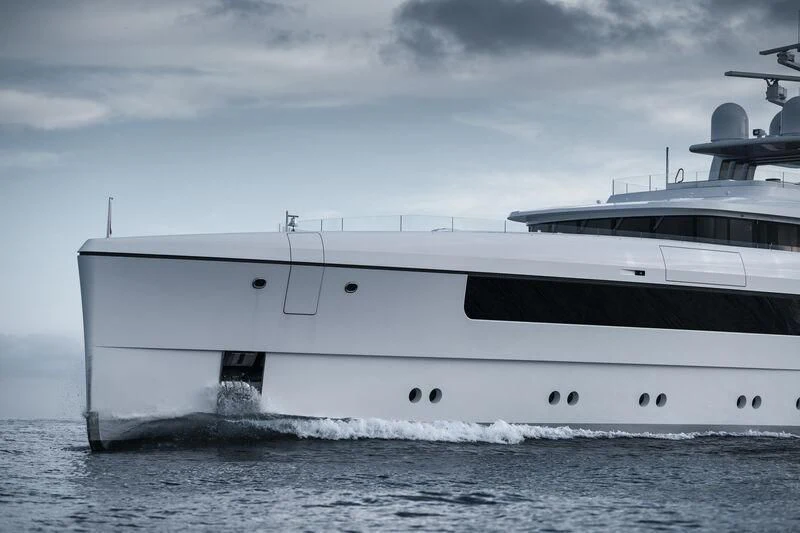 a white yacht in the water aboard JC Yacht for Sale