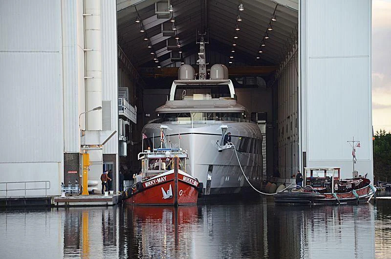 a large white ship docked aboard JC Yacht for Sale