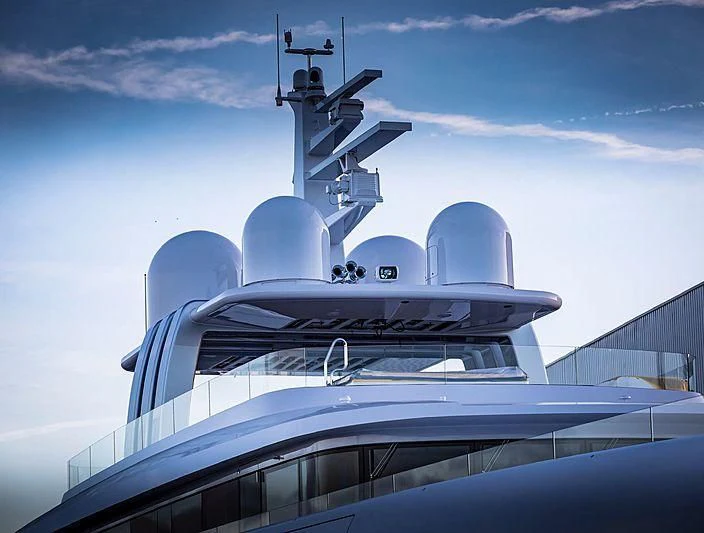 a large white building with a satellite on top aboard JC Yacht for Sale