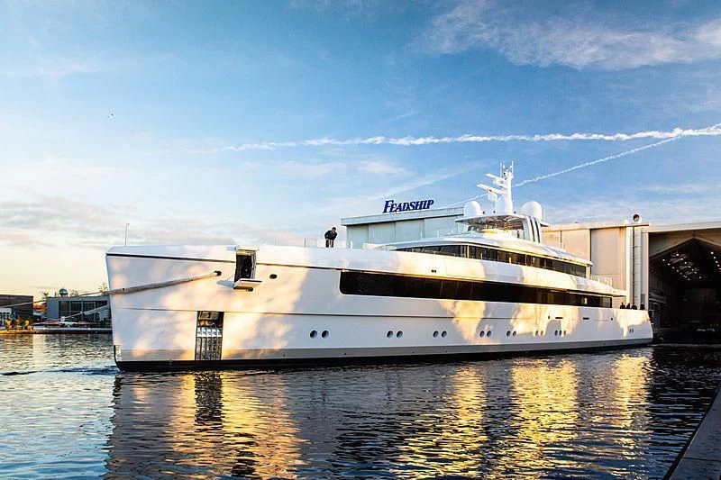 a large white boat in a body of water aboard JC Yacht for Sale