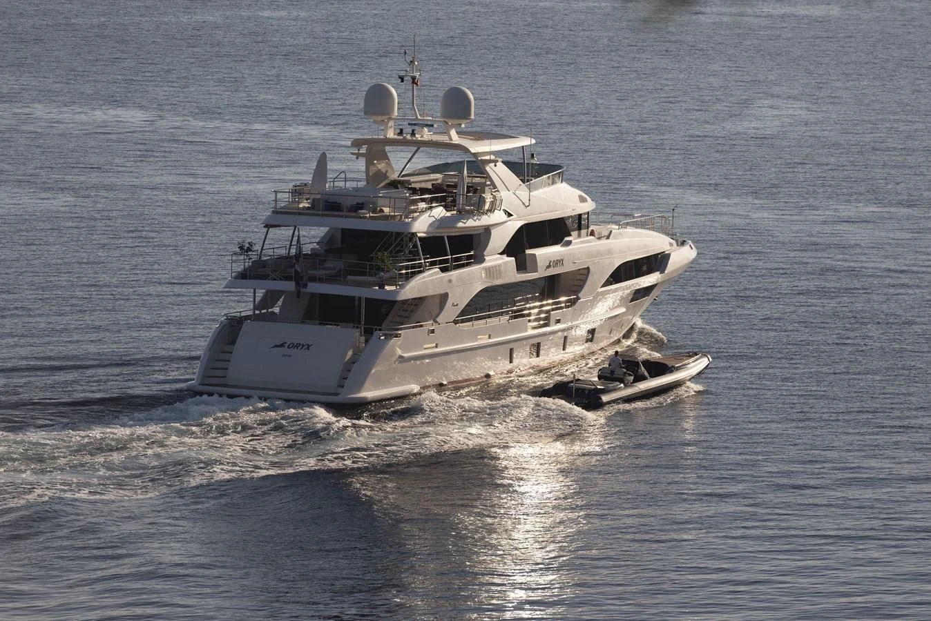 a large ship in the water aboard ORYX Yacht for Sale